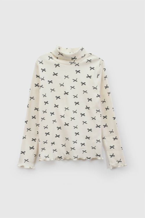 Polera de Niña Beige de Algodón con Cuello Alto y Estampado de Cintas